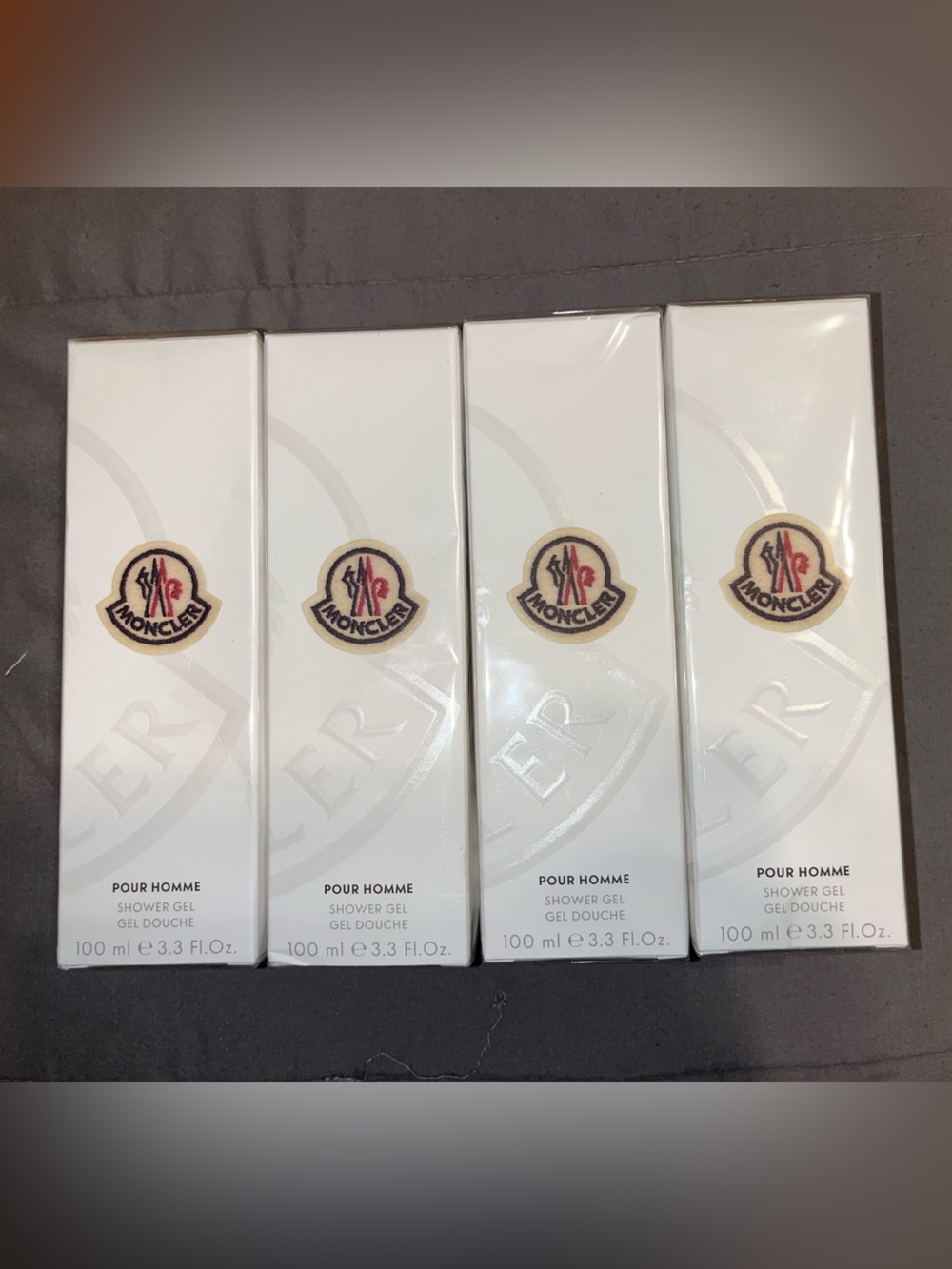 Moncler Pour Homme Fragrance 4 piece shower gel- White and Red Accents